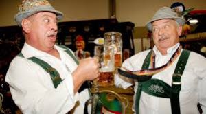 German men enjoying mugs of beer